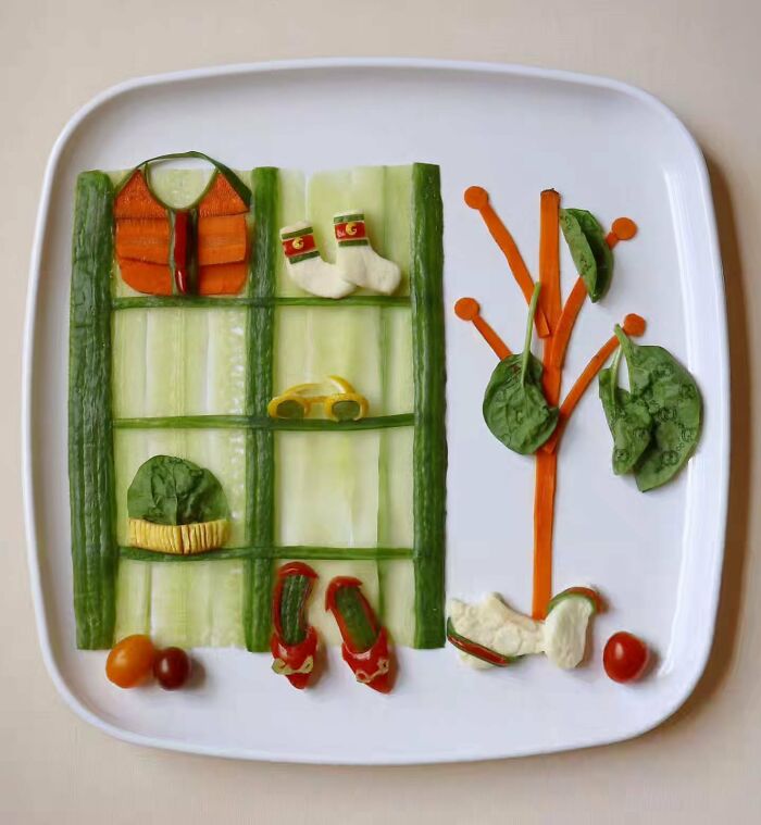 A closet and tree scene created with vegetables, showcasing everyday food turned into playful works of art