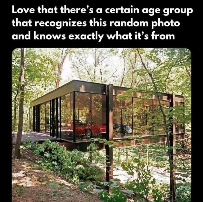 A modern glass garage with a red sports car inside surrounded by trees, invoking 80s kids nostalgic photos