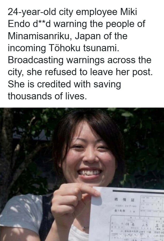 Miki Endo smiling and holding up a document representing heroic yet creepy facts about the tsunami