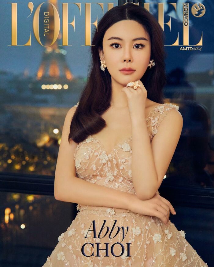 Cover photo of Abby Choi in floral evening dress with city view Cover photo of Abby Choi in floral evening dress with city view