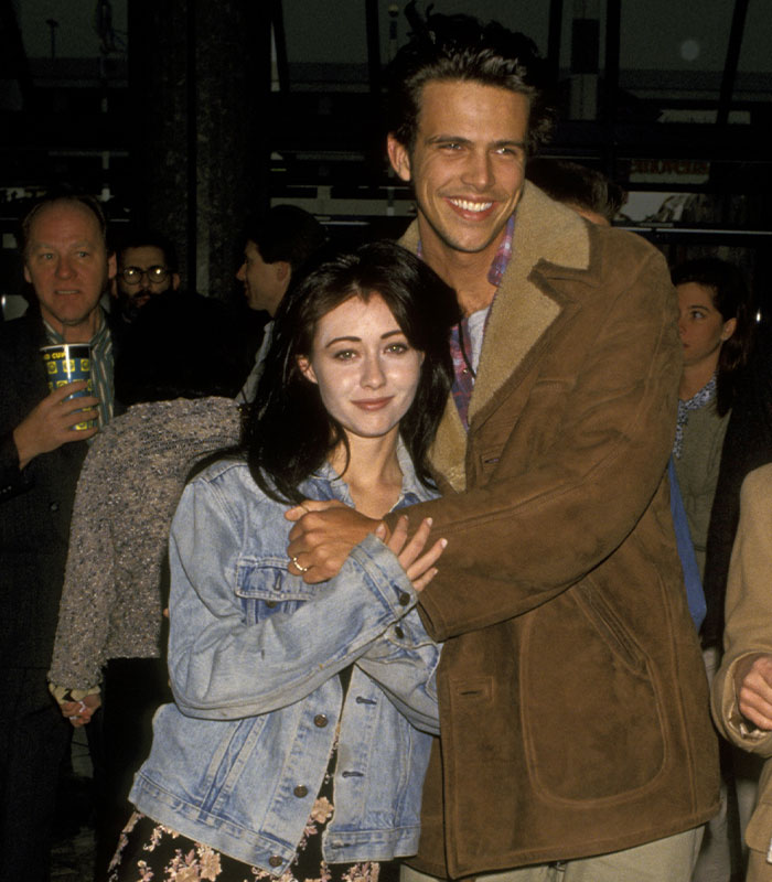 Shannen Doherty hugging Ashley Hamilton, examples of short celebrity marriages in pop culture history.