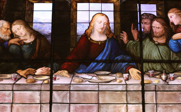 Close-up of stained glass showing Jesus and disciples at Last Supper Close-up of stained glass showing Jesus and disciples at Last Supper