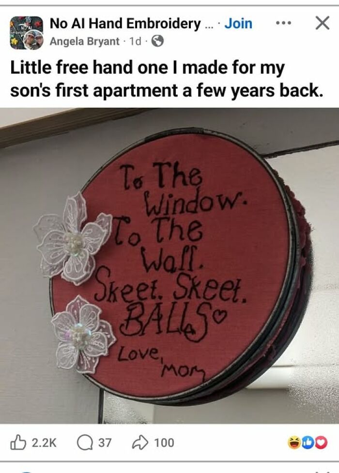 An embroidered red fabric hoop with funny lyrics, representing unusual craft ideas.