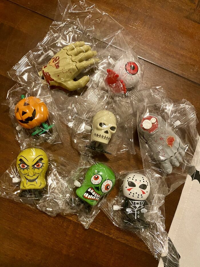 Halloween wind-up toys in spooky designs like skull and eyeball in plastic wrap