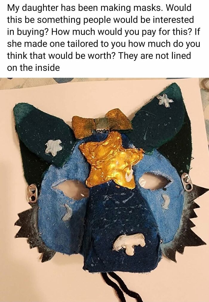 An amateurish, poorly made blue animal mask, showing the funny side of hilarious crafts and art projects.