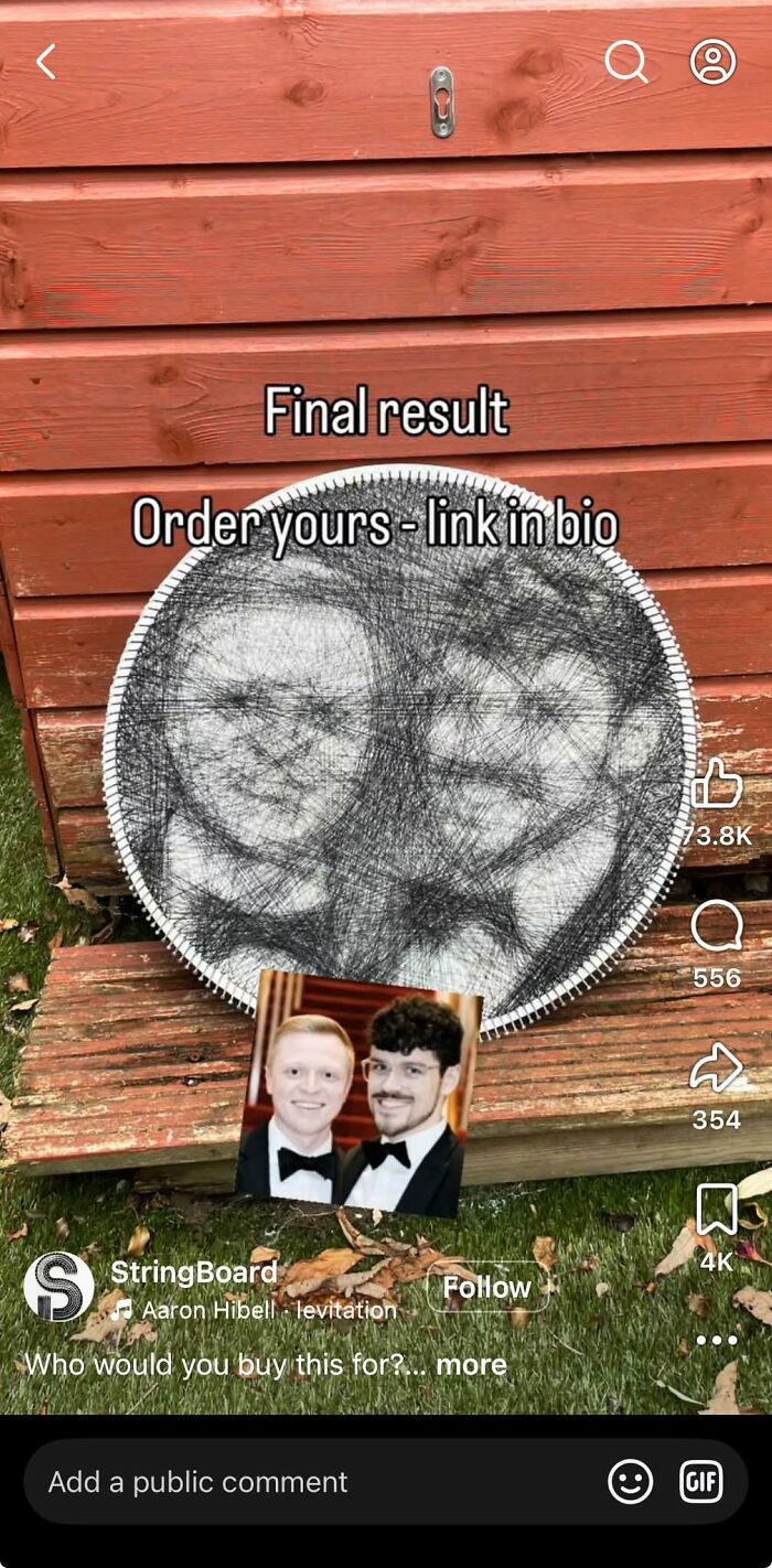 A detailed string art project showing a portrait of two men