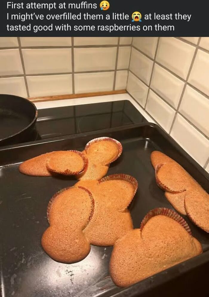 Hilarious baking fail showing overfilled muffins that spread flat across a baking pan.