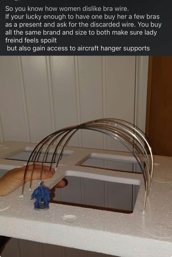 A miniature aircraft hangar support made of bra underwires as a funny diy craft project.