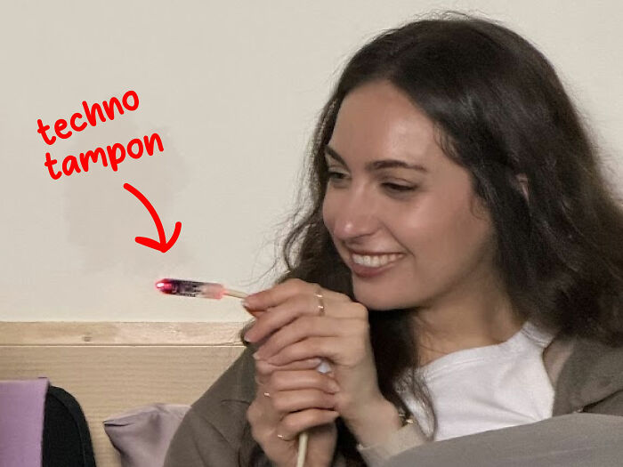 Biohacker Bryan Johnson girlfriend holding a techno tampon device to address overlooked female health issue. Biohacker Bryan Johnson girlfriend holding a techno tampon device to address overlooked female health issue.