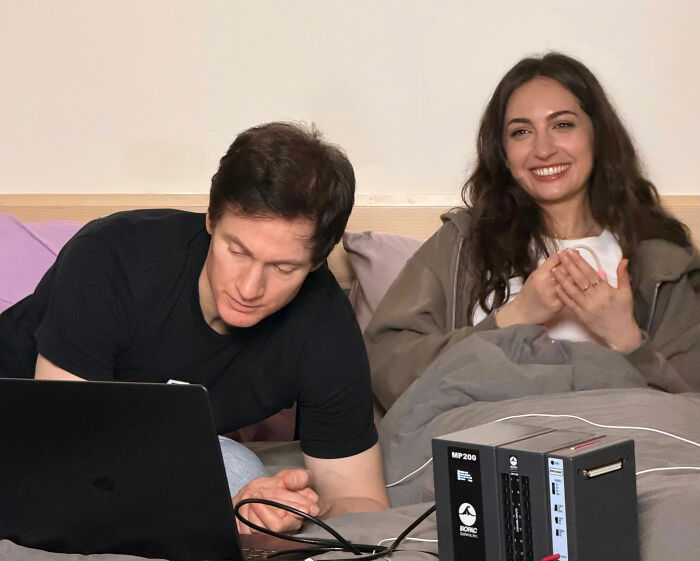 Biohacker Bryan Johnson and his girlfriend sitting in bed with biometric monitoring equipment to address a female health issue Biohacker Bryan Johnson and his girlfriend sitting in bed with biometric monitoring equipment to address a female health issue