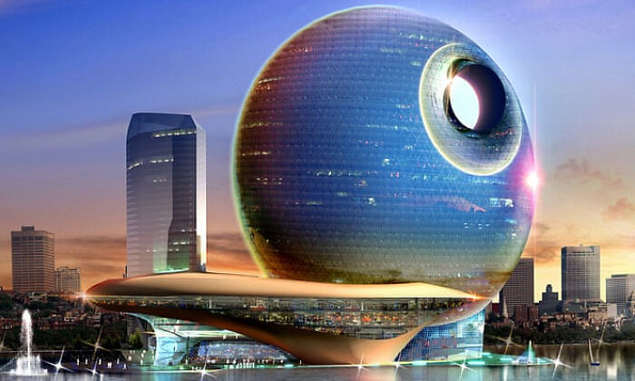 Futuristic spherical strange building glowing at sunset in cityscape