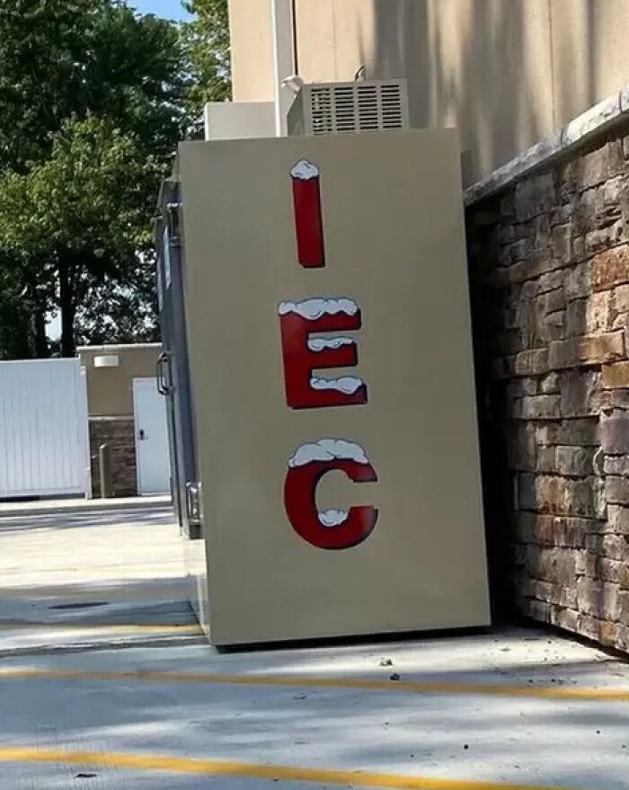 An ice machine with vertically stacked letters ICE looking like IEC, an example of advertising fails.