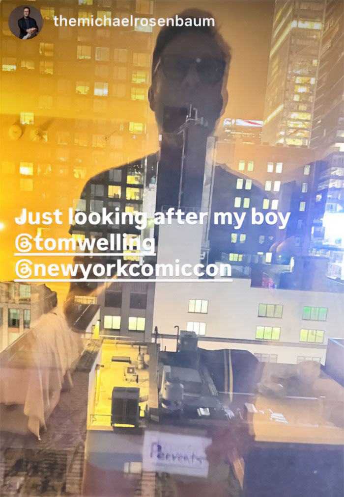 Social media post showing a window reflection of a city building