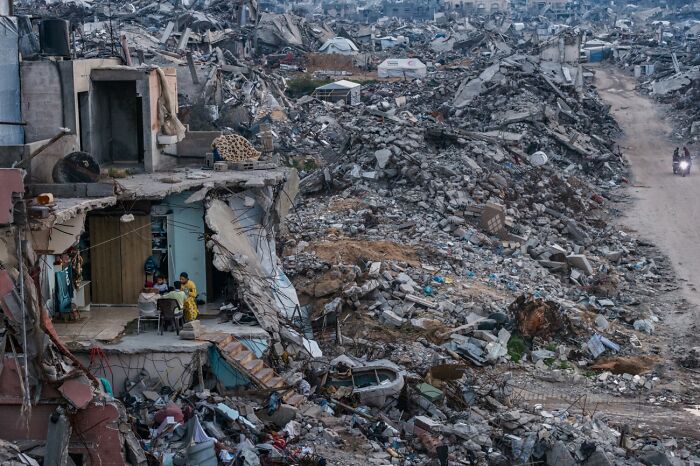 Destroyed city landscape showing rubble and damaged buildings after conflict