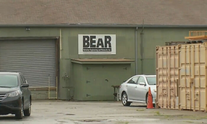 Exterior view of a workplace building with a BEAR sign related to a woman hid a spy camera at work story Exterior view of a workplace building with a BEAR sign related to a woman hid a spy camera at work story