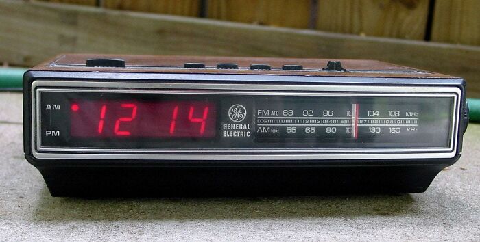 Vintage General Electric digital alarm clock radio bringing back nostalgic memories for '80s kids.