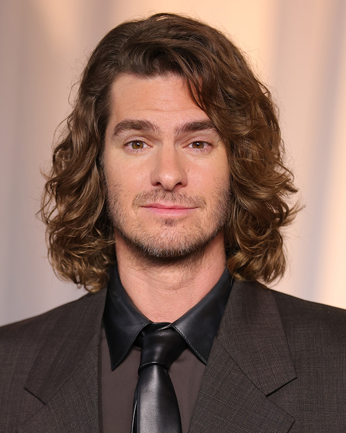 Unedited photo of Andrew Garfield with long shoulder-length hair at the Academy Museum Gala.