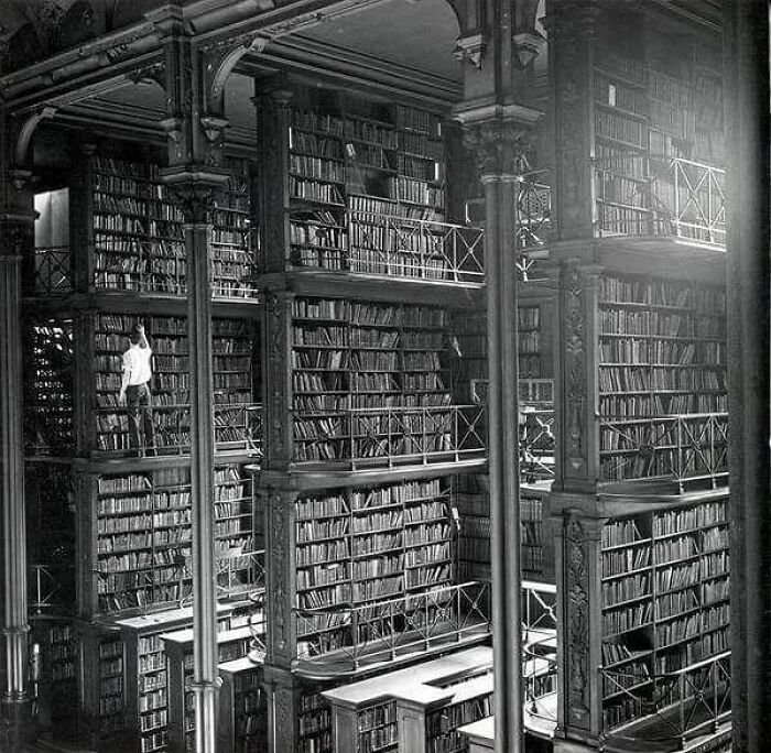 A Man Browsing For Books In Cincinnati's Cavernous Old Main Library. The Library Was Demolished In 1955