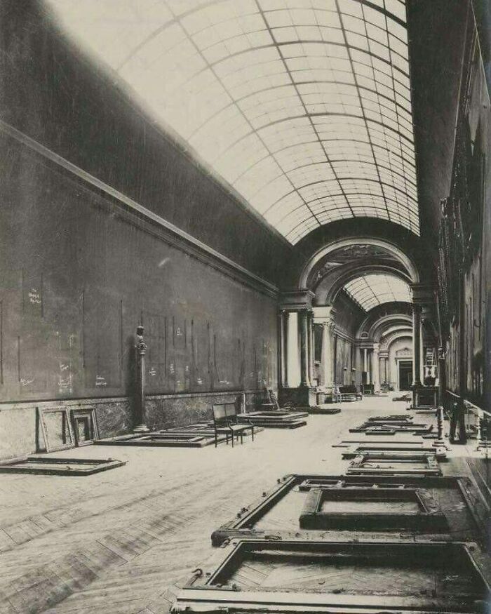 The Grande Galerie In The Louvre Abandoned During The World War II. Photograph By Marc Vaux 1940s