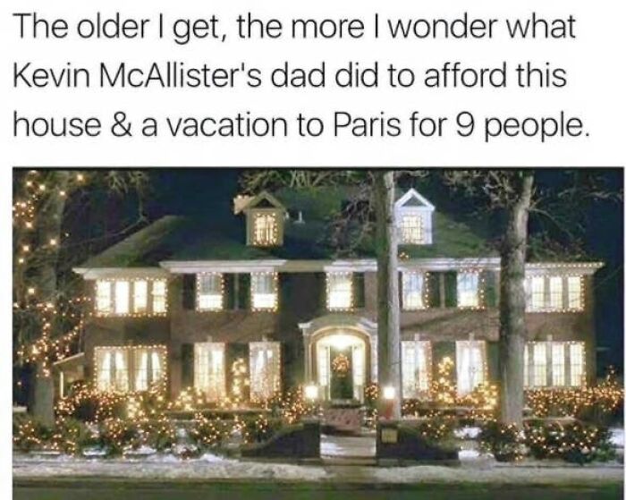 Nostalgic image of the Home Alone house decorated with glowing Christmas lights.
