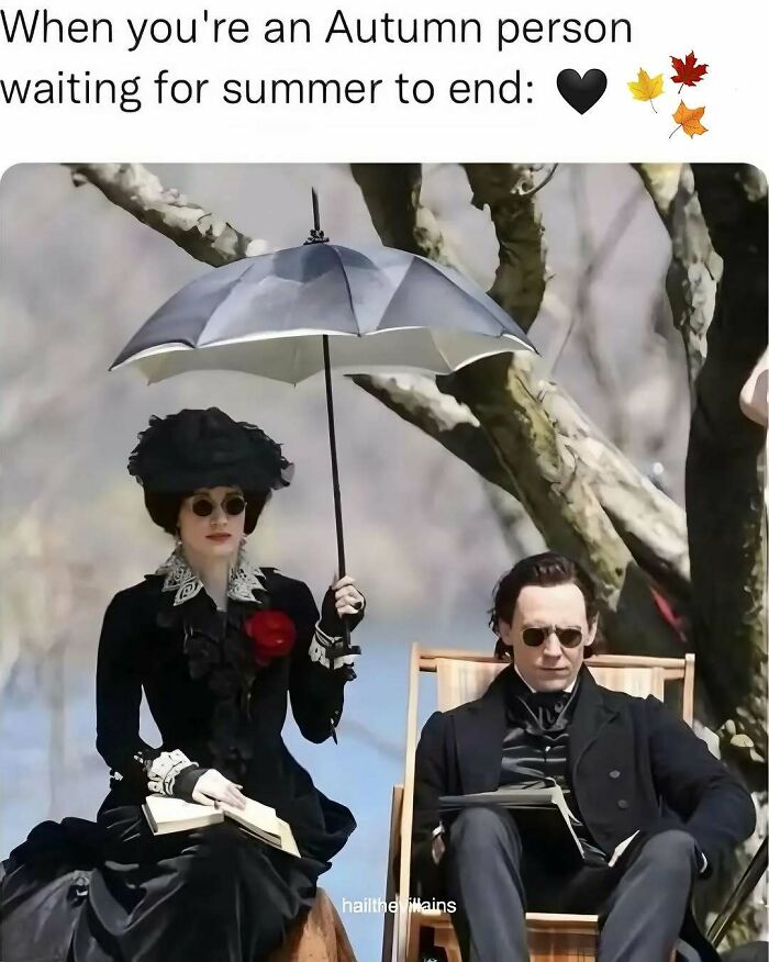 Spooky season meme showing two people dressed in dark gothic clothing sitting under an umbrella.
