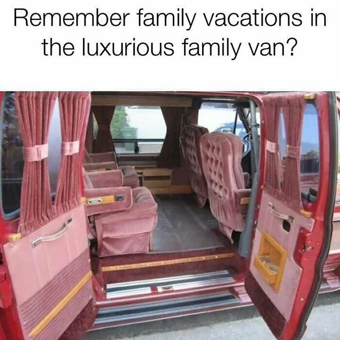 A nostalgic custom family van with pink velvet seats and matching curtains.