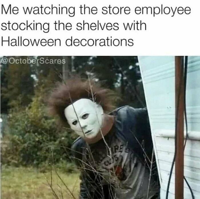 Michael Myers peeking from behind a wall meme about early spooky season shopping