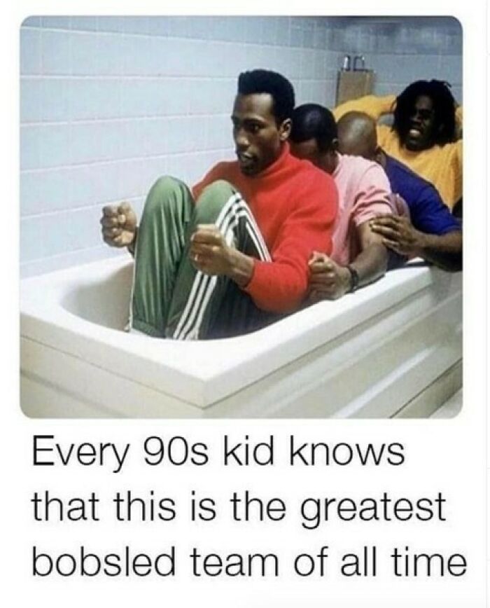Nostalgic scene of the Cool Runnings movie cast sitting inside a bathtub pretending to ride a bobsled