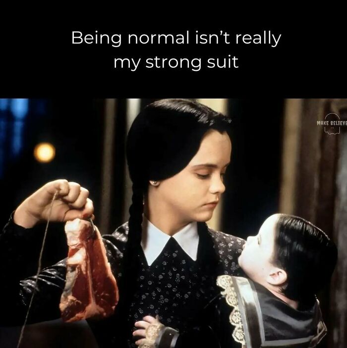 Wednesday Addams holding a piece of raw meat, showcasing spooky season memes and quirky humor.