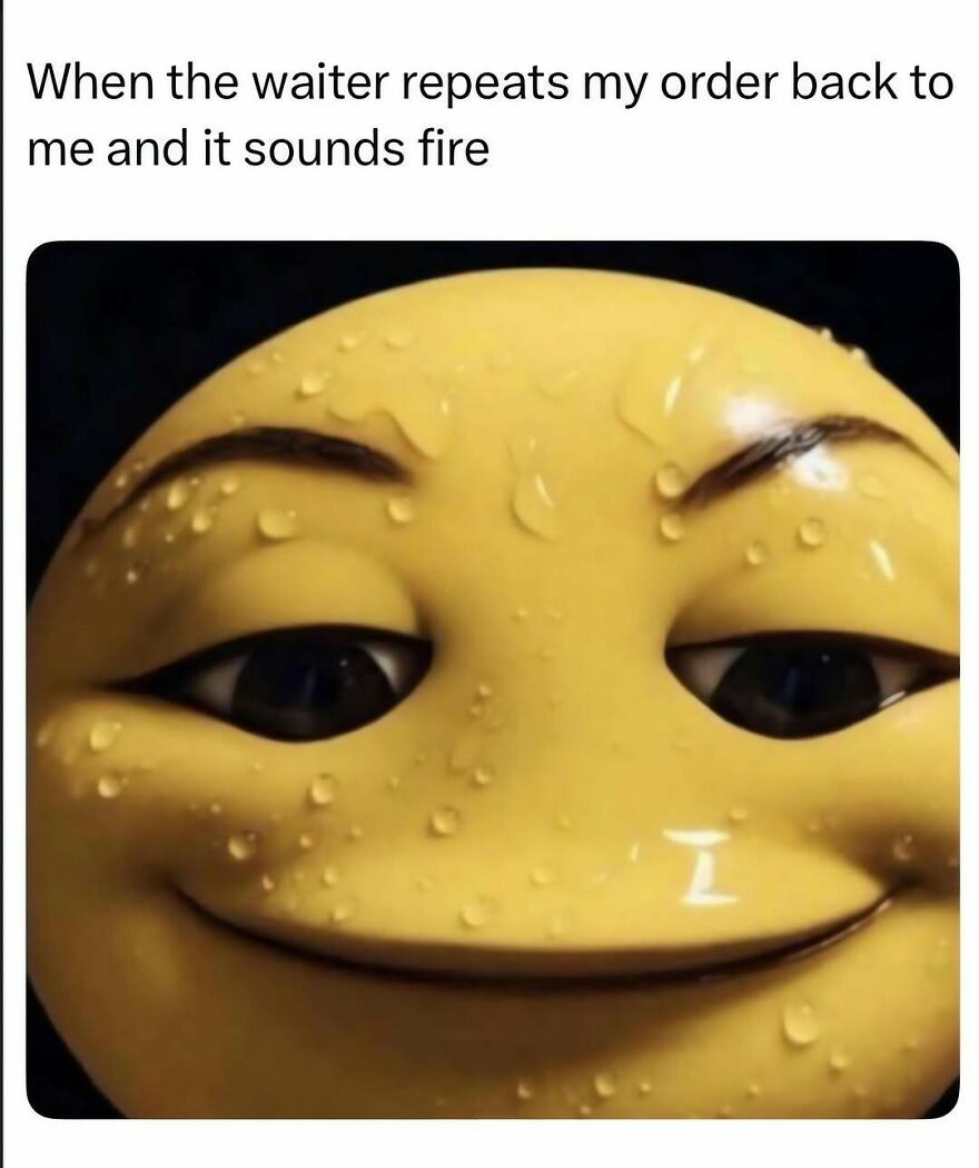 A sweaty yellow emoji smiling with eyebrow raised, making for one of the weirdest out-of-context pics.