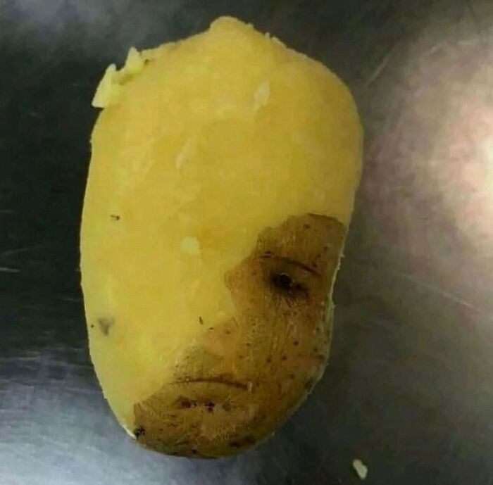 A peeled potato with skin that resembles a human face, highlighted in hilarious pics.
