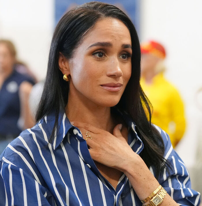 Meghan Markle looking concerned while reacting to allegations. Meghan Markle looking concerned while reacting to allegations.