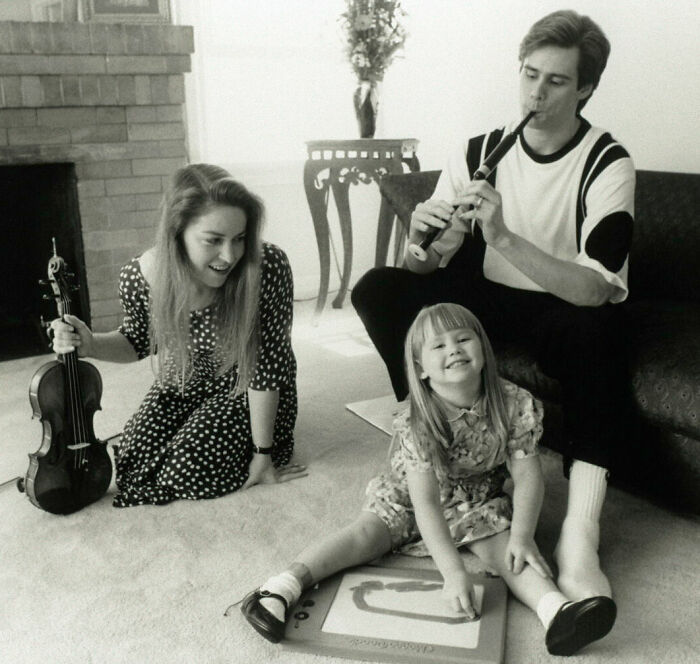 An archival black and white photo of Jim Carrey with his family An archival black and white photo of Jim Carrey with his family