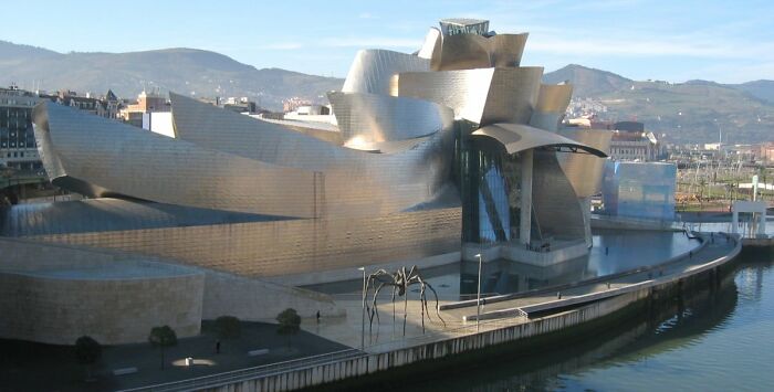 Abstract metallic structure of the Guggenheim Museum Bilbao with angular, flowing shapes