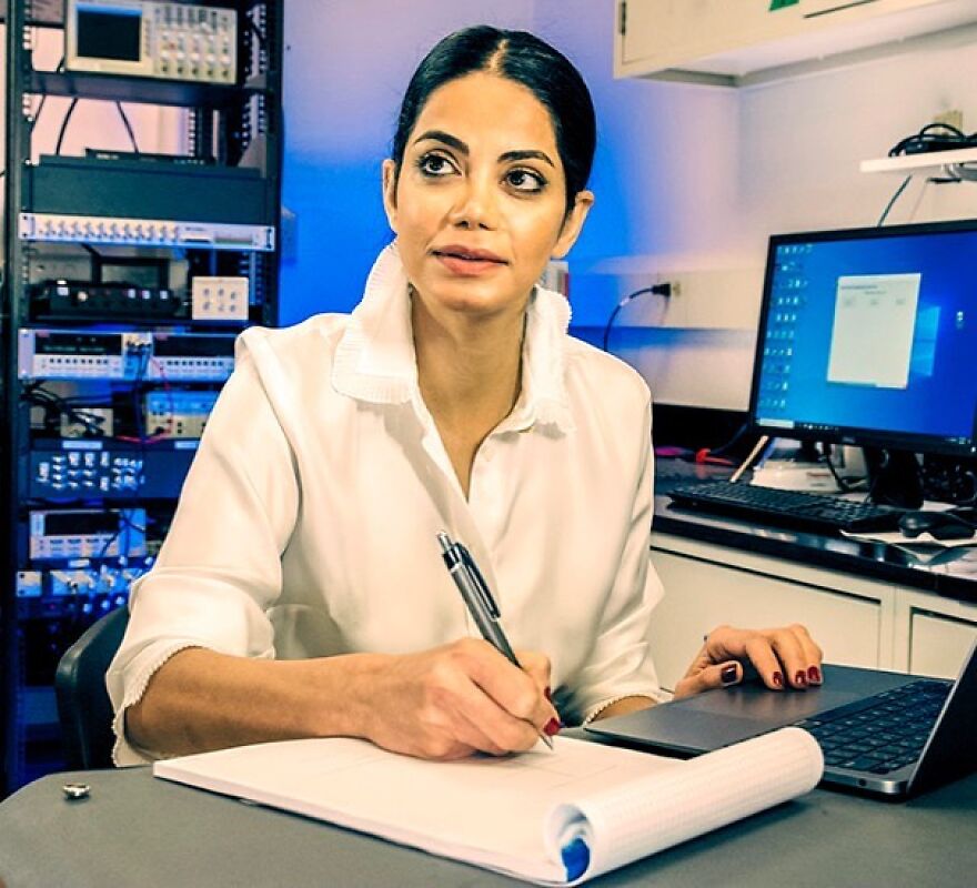Researcher in lab taking notes on sensory deprivation study Researcher in lab taking notes on sensory deprivation study