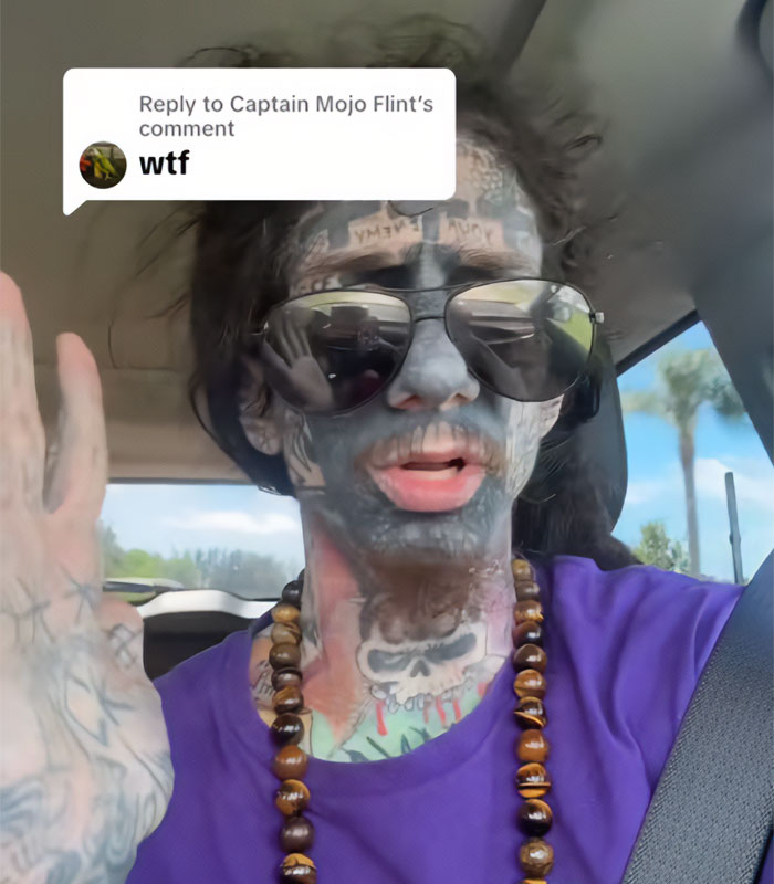 Florida Demonologist with heavy facial tattoos wearing sunglasses and driving a car Florida Demonologist with heavy facial tattoos wearing sunglasses and driving a car