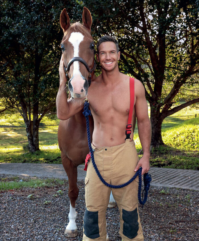 Australian firefighter posing with horse in 2027 firefighters calendar