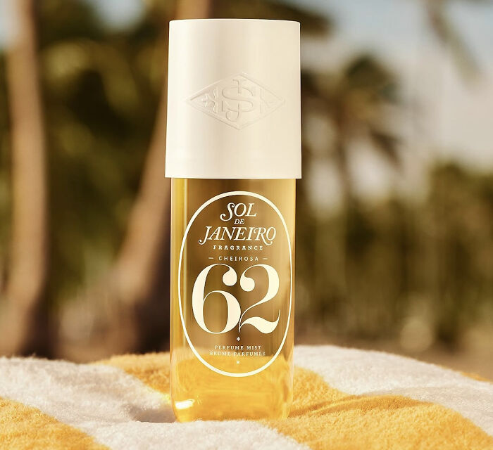 Sol de Janeiro perfume mist bottle on a beach towel, a top trending item for Amazon Big Deal Days