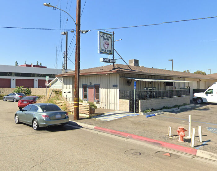 Exterior view of the Salty Dawg Tavern, a California bar involved in a viral tipping debate.