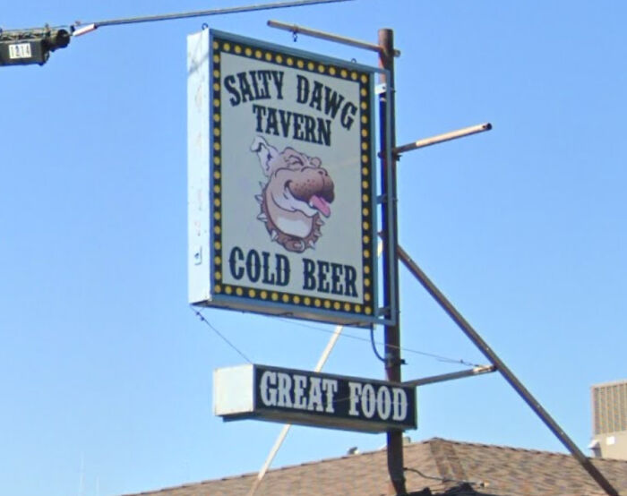 Outdoor sign for Salty Dawg Tavern, a California bar involved in a controversy over a customer tip.