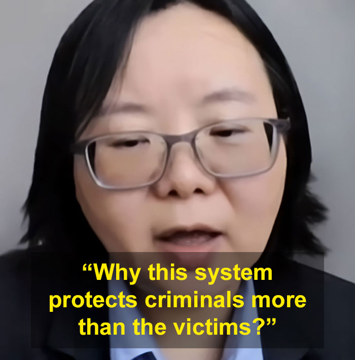 A woman with glasses speaking about justice after discovering a spy camera at work. A woman with glasses speaking about justice after discovering a spy camera at work.