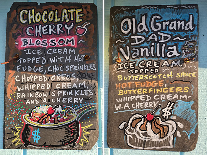 Chalkboard menus displaying ice cream flavors at the shop of the viral owner. Chalkboard menus displaying ice cream flavors at the shop of the viral owner.