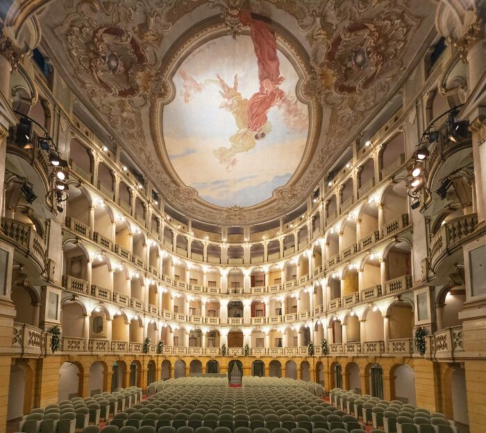 An empty historic opera house interior with ceiling art, highlighted in The Perspa Awards 2026.