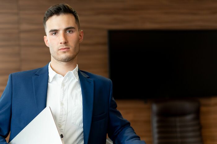 Serious looking businessman who has found secrets