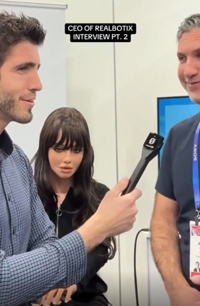 An interview showcasing a humanoid robot, depicting advanced technology and modern life in America.