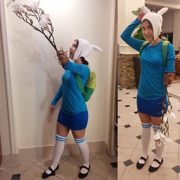 A woman with one arm incorporated into her Finn costume for a creative Halloween look.