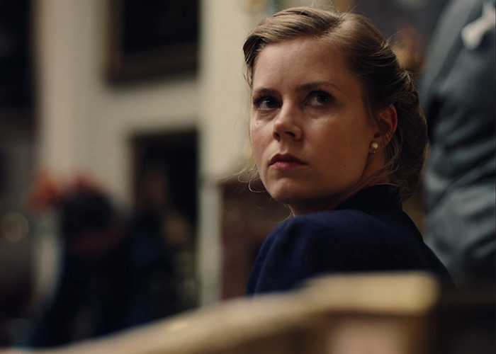 Amy Adams looking serious in a movie scene during a debate over the Hollywood star career slump.