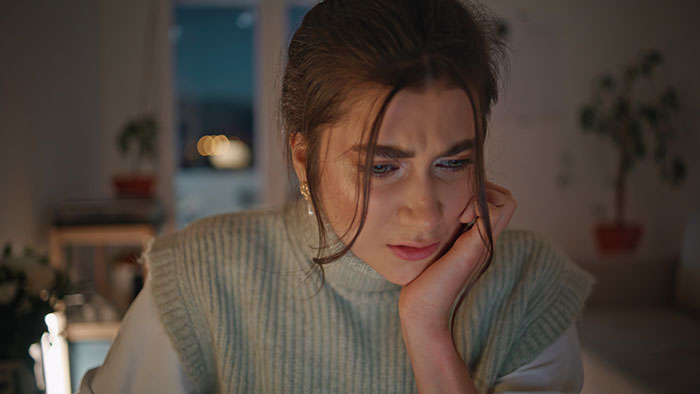Distressed teen girl worried about lies involving best friend's brothers Distressed teen girl worried about lies involving best friend's brothers