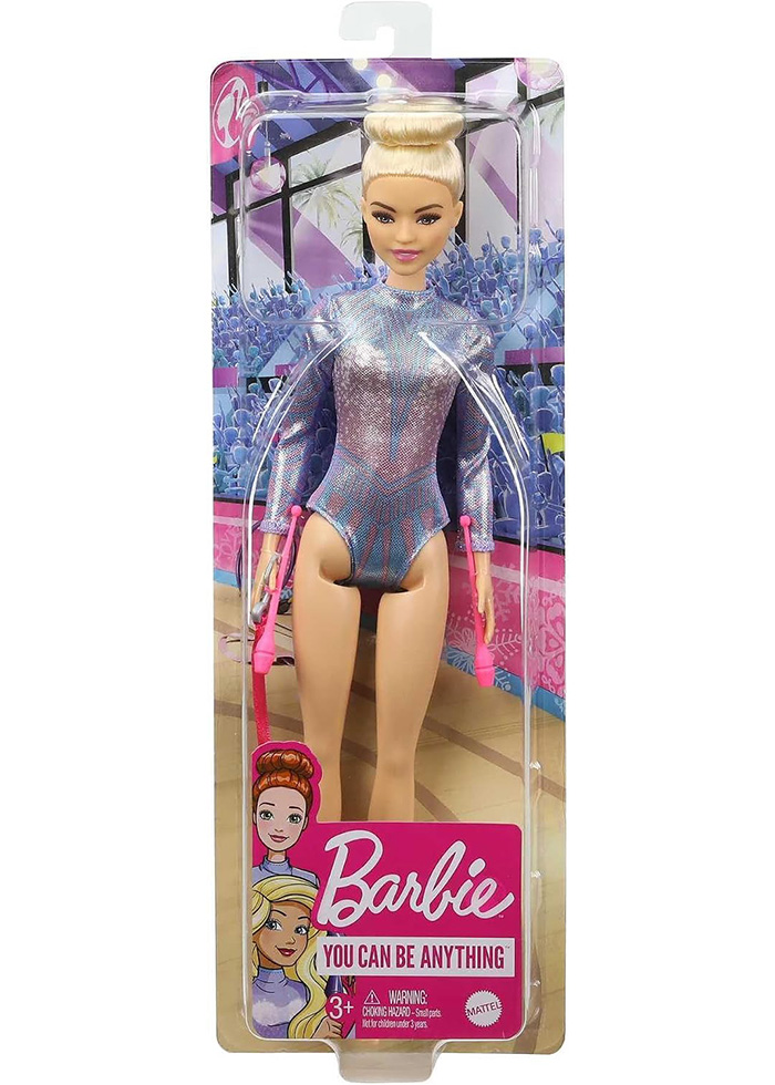 Gymnast Barbie doll packaged in plastic box, linked to controversy over alleged extremist symbolism.