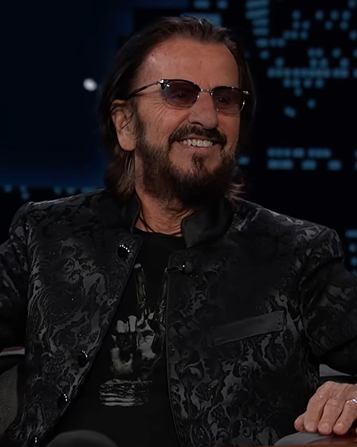Ringo Starr smiling in glasses, discussed alongside Barry Keoghan upcoming role and cosmetic procedure details.